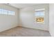 Bright bedroom with large windows offering views of the surroundings at 1923 Westport Ave, Berthoud, CO 80513