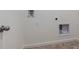 A clean and functional laundry room with outlets and water hookups at 1923 Westport Ave, Berthoud, CO 80513