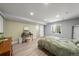 Basement bedroom with modern decor, hard surface flooring, good natural light, and space for a vanity at 2153 Mountain Iris Dr, Erie, CO 80516