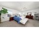 Bright bedroom with big windows, a ceiling fan and warm sunlight at 2153 Mountain Iris Dr, Erie, CO 80516