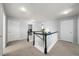 Upstairs hallway provides easy access to all bedrooms, ensuring convenience and privacy for residents at 2153 Mountain Iris Dr, Erie, CO 80516
