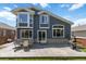 Charming backyard with a patio area and outdoor grill, perfect for outdoor gatherings and barbecues at 2261 Alpine Dr, Erie, CO 80516
