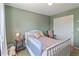 The inviting bedroom features soft natural light and ample closet space at 2261 Alpine Dr, Erie, CO 80516