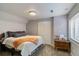 Cozy bedroom featuring a neutral color scheme and a comfortable bed with soft bedding at 2261 Alpine Dr, Erie, CO 80516