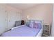 A cozy bedroom with a plush bed and spacious closet, providing ample storage at 2261 Alpine Dr, Erie, CO 80516