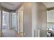 Upstairs hallway with doorways to bedrooms and a full bath at 2261 Alpine Dr, Erie, CO 80516