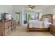 Spacious main bedroom with a bay window and ensuite bathroom at 2261 Alpine Dr, Erie, CO 80516