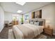 Cozy bedroom featuring a comfortable bed, stylish decor, and plenty of natural light at 43343 E Arkansas Pl, Bennett, CO 80102