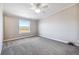 Simple bedroom with carpet and ceiling fan at 43343 E Arkansas Pl, Bennett, CO 80102