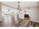 Open concept dining area with hardwood floors at 43343 E Arkansas Pl, Bennett, CO 80102