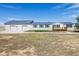 House exterior with attached garage and deck at 43343 E Arkansas Pl, Bennett, CO 80102