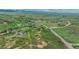 Aerial view highlighting the property's location amidst the natural landscape at 6334 Cherokee Dr, Sedalia, CO 80135
