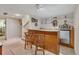 A cozy bar area with seating and counter space, ideal for entertaining guests at 6334 Cherokee Dr, Sedalia, CO 80135