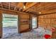 Barn interior with wood framed openings and lots of space at 6334 Cherokee Dr, Sedalia, CO 80135