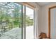 View of a wood deck with railing accessible through sliding glass doors of the primary bedroom at 6334 Cherokee Dr, Sedalia, CO 80135