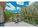Lovely backyard view from the deck with table and chairs, perfect for entertaining at 6334 Cherokee Dr, Sedalia, CO 80135