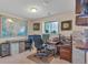 Bright home office features two workstations, a window, file cabinets, and natural light at 6334 Cherokee Dr, Sedalia, CO 80135