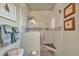 A spacious updated shower with glass enclosure, rain shower head, and tiled accent wall at 6334 Cherokee Dr, Sedalia, CO 80135