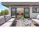 Inviting balcony area with comfortable seating, offering a seamless transition to the living room at 1500 S Elizabeth St, Denver, CO 80210