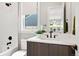 Modern bathroom featuring a tub with subway tile surround, sleek fixtures, and a stylish vanity at 1500 S Elizabeth St, Denver, CO 80210