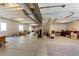 Large unfinished basement with concrete floors, white walls, and exposed ductwork at 5230 Periwinkle Way, Henderson, CO 80640