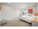 Bright bedroom with white walls, carpet, a closet, and a window at 5853 S Havana Ct, Englewood, CO 80111
