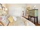 Comfortable bedroom featuring hardwood floors, a closet, and unique decorative accents at 4505 S Yosemite St # 106, Denver, CO 80237