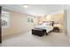 Bright bedroom with neutral colors and comfortable furnishings for a cozy atmosphere at 4505 S Yosemite St # 106, Denver, CO 80237