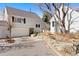 Charming home featuring a two-car garage, landscaped front yard and traditional architecture at 4505 S Yosemite St # 106, Denver, CO 80237