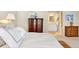 Serene main bedroom leads to an ensuite bathroom with ample natural light at 4505 S Yosemite St # 106, Denver, CO 80237