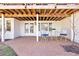 Outdoor patio area with brick pavers and furniture, accessed by glass patio doors at 4505 S Yosemite St # 106, Denver, CO 80237