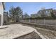 Large backyard featuring a patio, fence, and manicured landscaping at 19406 E Maplewood Pl, Aurora, CO 80016