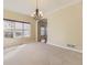 Bright dining area featuring neutral walls and a large window at 19406 E Maplewood Pl, Aurora, CO 80016