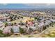 Overhead shot of a home within a neighborhood with golf course access at 7022 Secrest Ct, Arvada, CO 80007