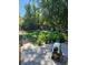 Large backyard with playset and garden area at 348 Emery Rd, Northglenn, CO 80233
