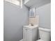 Close up of the bathroom showing toilet, vanity and a window at 348 Emery Rd, Northglenn, CO 80233