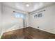 Bright bedroom with hardwood floors and large windows at 348 Emery Rd, Northglenn, CO 80233