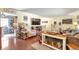 Spacious living room with a fireplace, large television, and comfortable seating at 2079 S Quintero St, Aurora, CO 80013
