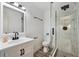 Modern bathroom featuring a glass-enclosed shower and sleek fixtures at 235 N 12Th Ave, Brighton, CO 80601