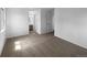 A bright bedroom that leads into a vanity area and features neutral walls and carpet at 10248 Quivas St, Thornton, CO 80260