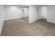 This bedroom offers neutral walls and carpeting, with a mirrored closet and plenty of space at 10248 Quivas St, Thornton, CO 80260