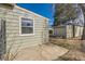 Backyard view featuring new siding and a storage shed, providing ample space at 1248 Moline St, Aurora, CO 80010