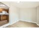 Empty dining area with tiled flooring and a view into the kitchen space at 1248 Moline St, Aurora, CO 80010