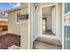 Bright entryway featuring modern wood-look flooring and a view into the home's open layout at 1248 Moline St, Aurora, CO 80010