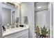 Bathroom featuring a vanity, shower and cactus-themed shower curtain at 3047 W 47Th Ave # 110, Denver, CO 80211