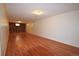 Unfinished basement featuring wood-look floors and stone accent wall; design the perfect space! at 8750 Rutgers St, Westminster, CO 80031