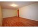 Unfinished basement with wood-look floors, ready for your creative design ideas at 8750 Rutgers St, Westminster, CO 80031