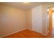 A bright bedroom features hardwood flooring and a closet at 8750 Rutgers St, Westminster, CO 80031