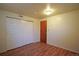 Bedroom with closet and wood-look floors at 8750 Rutgers St, Westminster, CO 80031