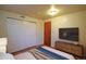 Stylized bedroom with closet, wood-look floors, and contemporary decor at 8750 Rutgers St, Westminster, CO 80031